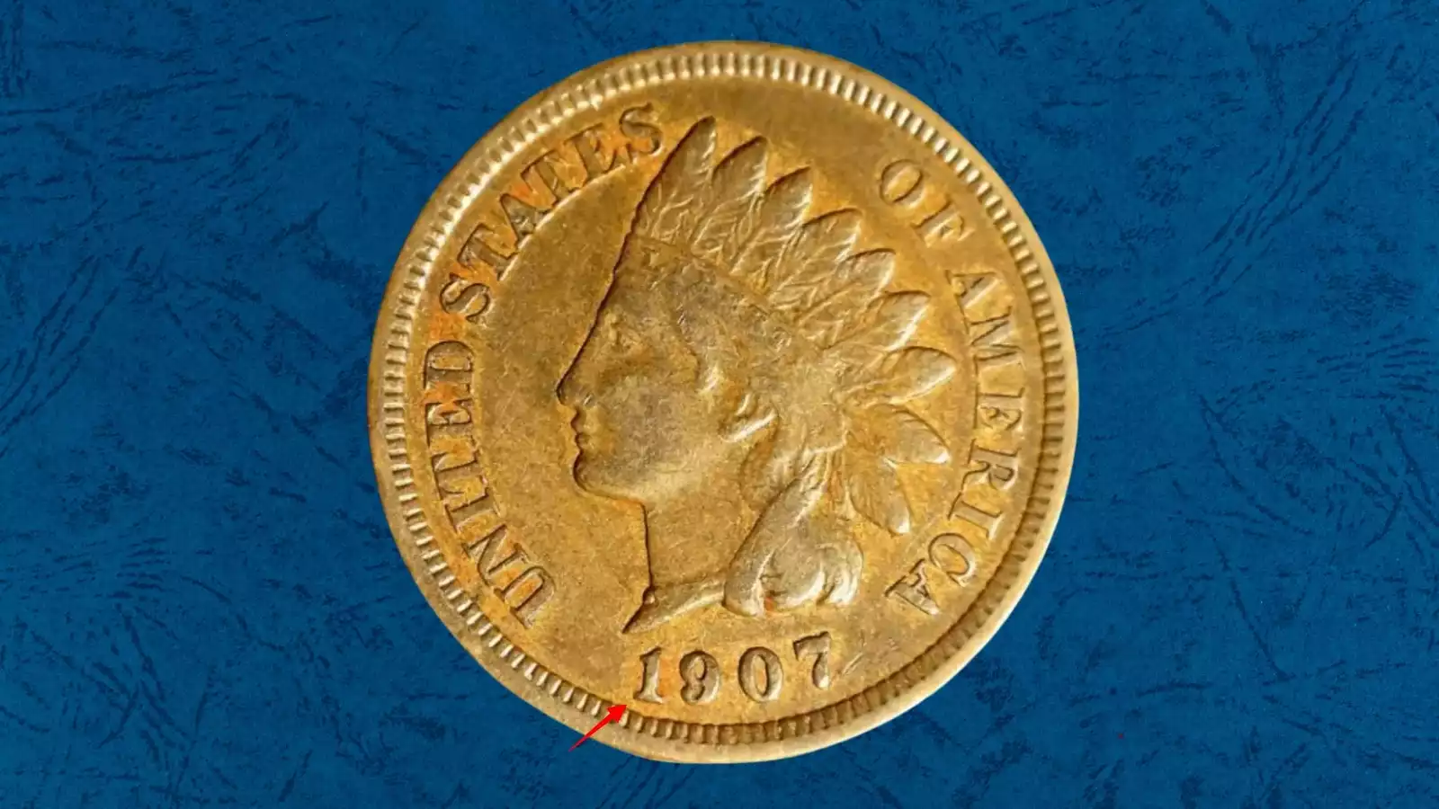 1907 Indian Head penny misplaced date error showing digit remnant in denticles below normal date position